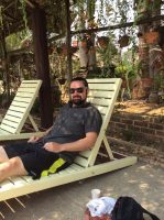 Lounging by the pool at the Princess Garden Hotel in Nyaungshwe, Myanmar.