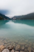 The fog lifting over Lake Louise.