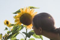 Stop and smell the flowers during your farm stay.