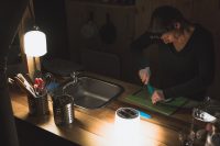 The platform tent kitchen is equipped for meal preparations.