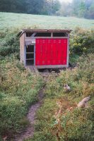 Collect fresh laid eggs for breakfast from the unique antique locker hen house.