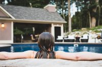 Relaxing in the saltwater pool is a must when staying at this pool house glampsite.