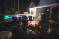 Enjoying the bonfire beside the pool.