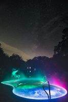 Night swimming in a swanky pool under the Milky Way? Yes please.