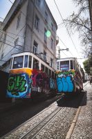 Lisbon is renown for its hilly terrain and trolley cars.