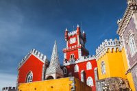 The town of Sintra, a forty minute train ride from Lisbon, is a UNESCO World Heritage Site and contains a bunch of amazing places, including the Palacio De Pena, a colorful palace built in the mid-1800s that's like something out of a fairy tale.