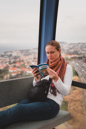 Catching up on some reading during the 20 minute ride from Funchal to Monte.