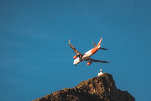 A plane landing at Madeira airport
