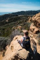 Enjoying the views from the top of the Temescal Canyon Trail in Topanga State Park in Los Angeles, California.