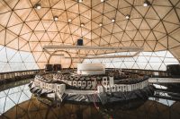 This greenhouse illustrates aquaponics and, in the future, will produce biogas via anaerobic digestion to sustain the property on renewable energy.