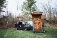 On the lower level, close to the pond and nicely appointed outhouse, there’s a full hookup site (a.k.a. The Hookup) for a camper (or a tent).  T